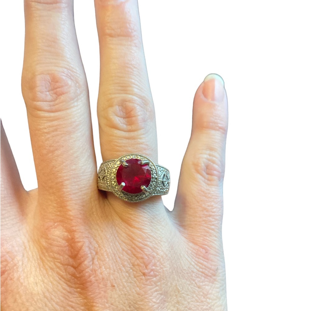 Bold silver ring with large red center stone